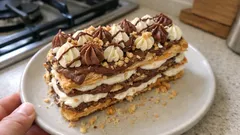 Tronchetto di sfoglia panna e Nutella: il dolce “wow” senza forno, pronto in frigo