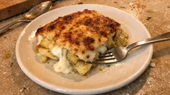 Parmigiana di carciofi e patate al forno: filante, dorata e facile da preparare