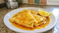 Crêpe Suzette in casa: crêpe morbide e salsa all’arancia, con flambé