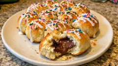 Danubio dolce di Carnevale: palline soffici ripiene di crema al cioccolato e glassa