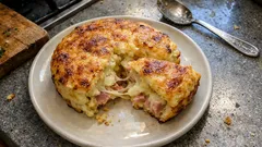 Tortino di patate ripieno: morbido dentro, dorato fuori (con prosciutto e formaggio)