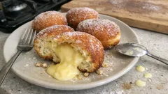 Bomboloni alla crema come al bar: soffici, alti e dorati con pochi accorgimenti